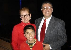 Carlos Orozco (right), an engineering professor, with his family. Orozco liked the fan dance in the program 