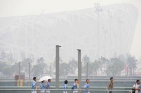 Пред Олимпийския стадион "Птиче гнездо" в Пекин.