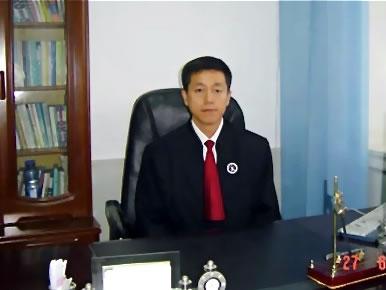 Уей Лянгюе, преди да бъде нелегално отвлечен и задържан от китайските власти